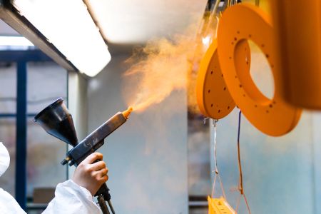 Industrial Powder Coating vs. Industrial Liquid Paint for Florida Heavy Equipment